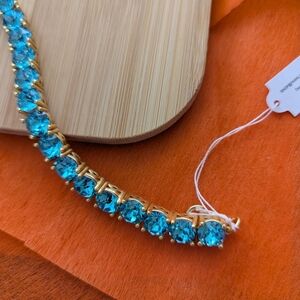 Elegant Gold and Blue Bracelet